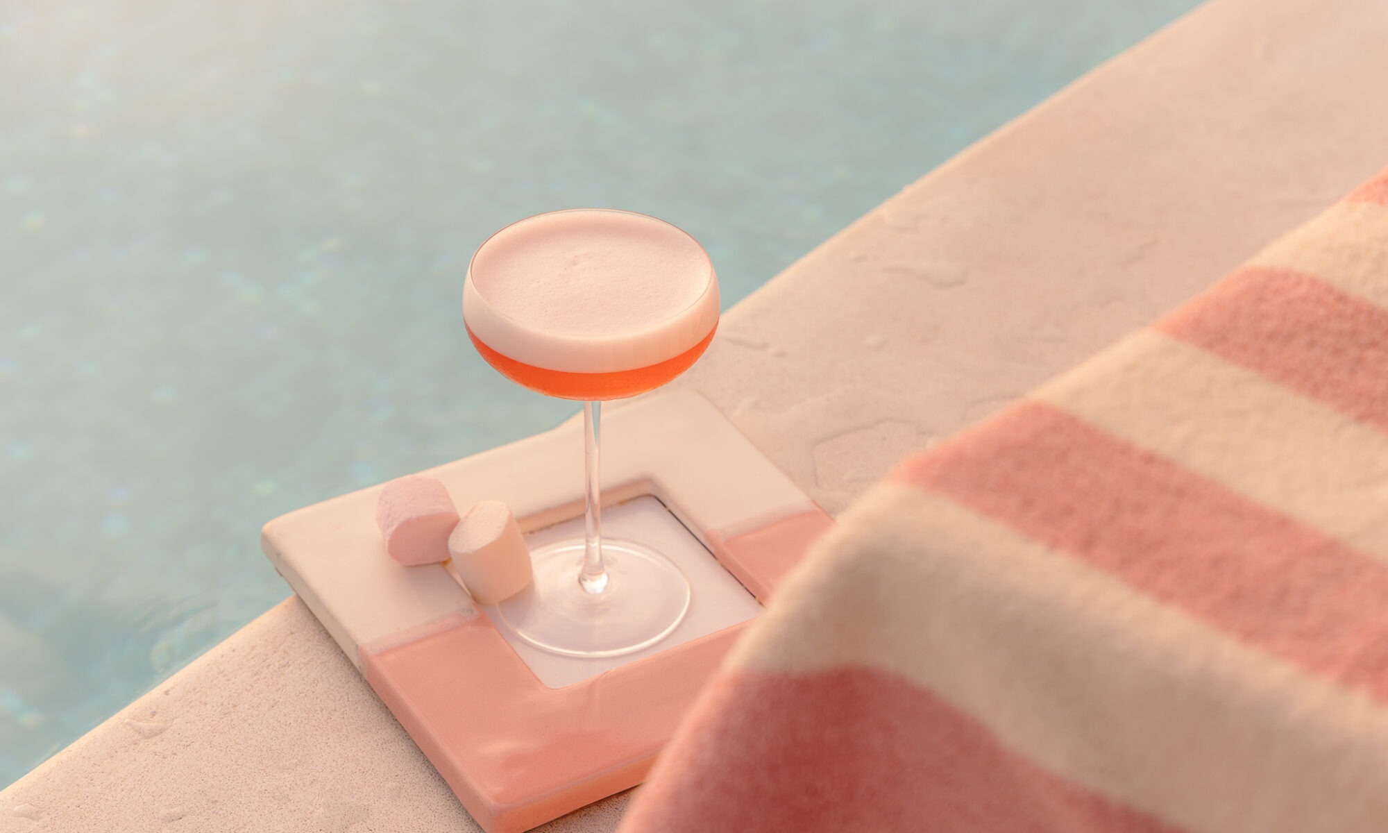 the 305 happy hour cocktail image by the pool - palm jumeirah